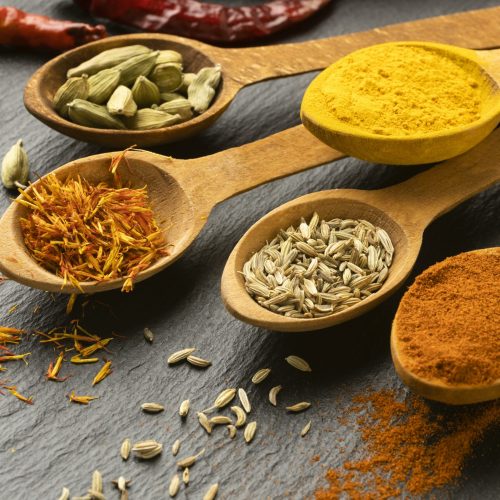 high-angle-indian-spices-with-spoons